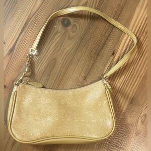 Pale mustard faux leather bag.
